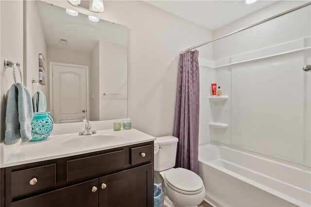 full bathroom with shower / bath combination with curtain, vanity, and toilet