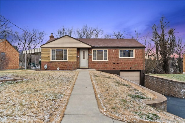 view of front of property featuring a garage