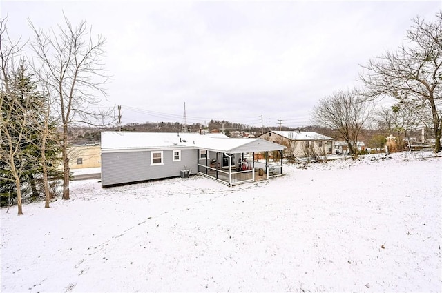 view of snow covered house