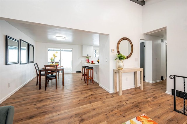 dining area featuring wood-type flooring