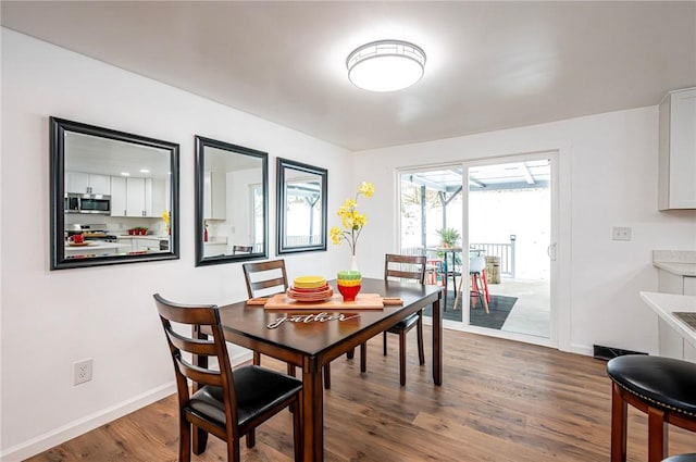 dining room featuring dark hardwood / wood-style floors