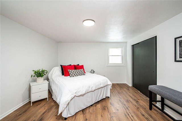 bedroom featuring hardwood / wood-style floors