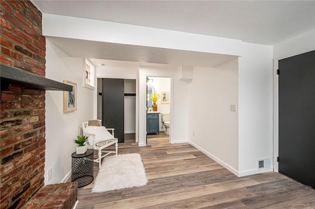 hall featuring hardwood / wood-style floors