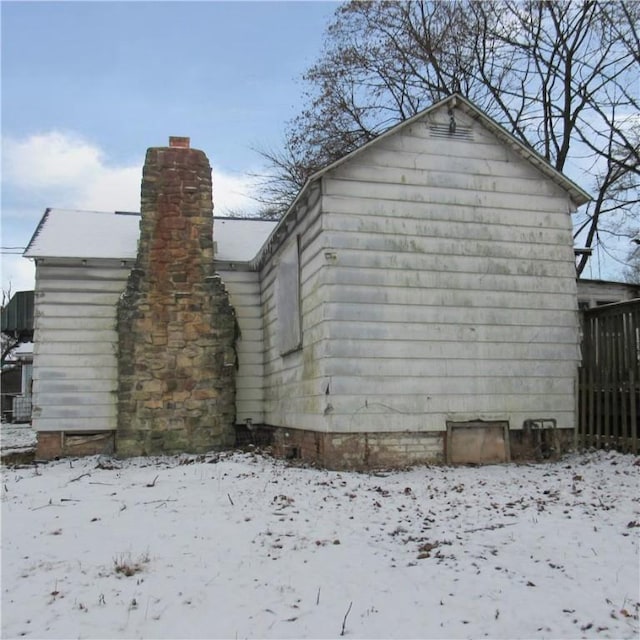 view of snow covered property