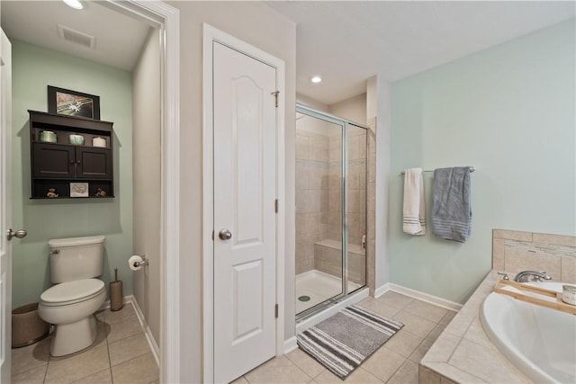 bathroom with separate shower and tub, tile patterned flooring, and toilet