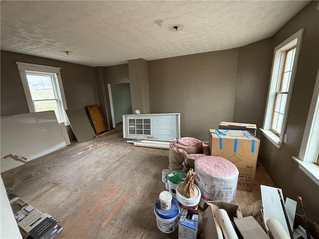 miscellaneous room featuring a textured ceiling