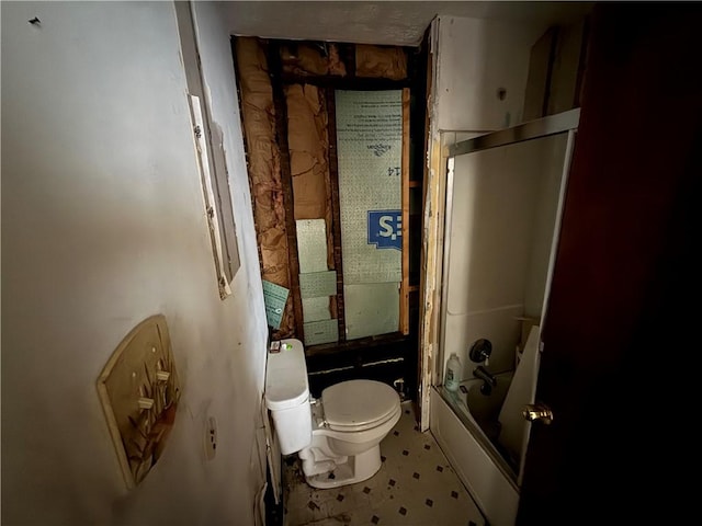 bathroom featuring shower / bath combination and toilet