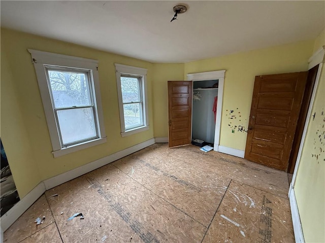 unfurnished bedroom featuring a closet