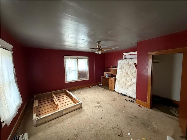 interior space featuring ceiling fan