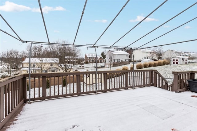 view of snow covered deck