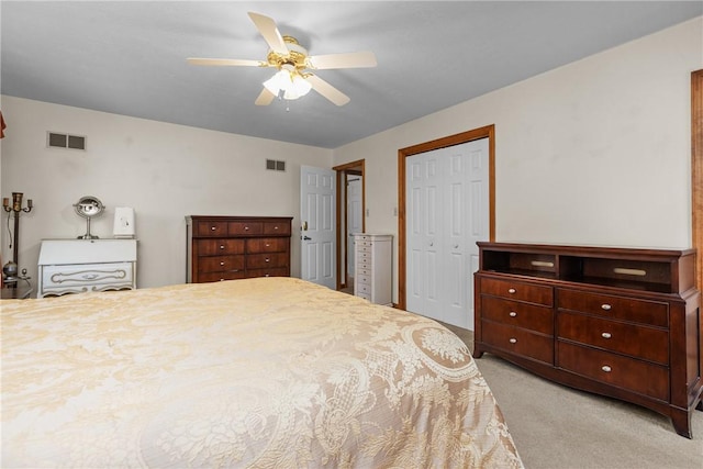 bedroom with light carpet and ceiling fan