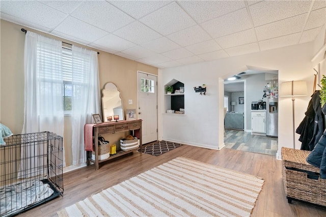 sitting room featuring hardwood / wood-style floors