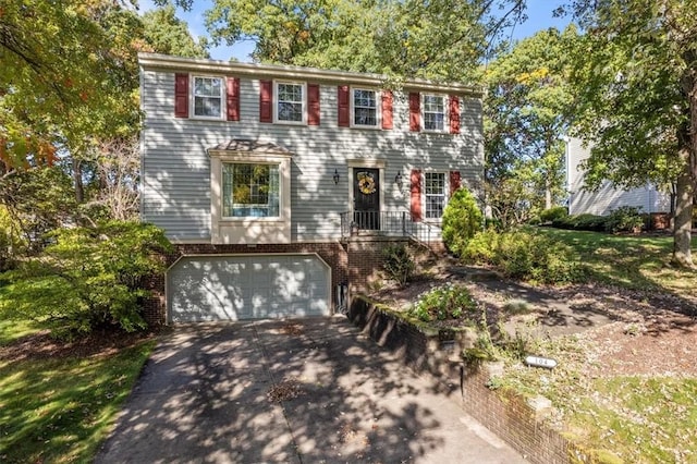 colonial house featuring a garage