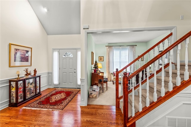 entrance foyer with hardwood / wood-style floors