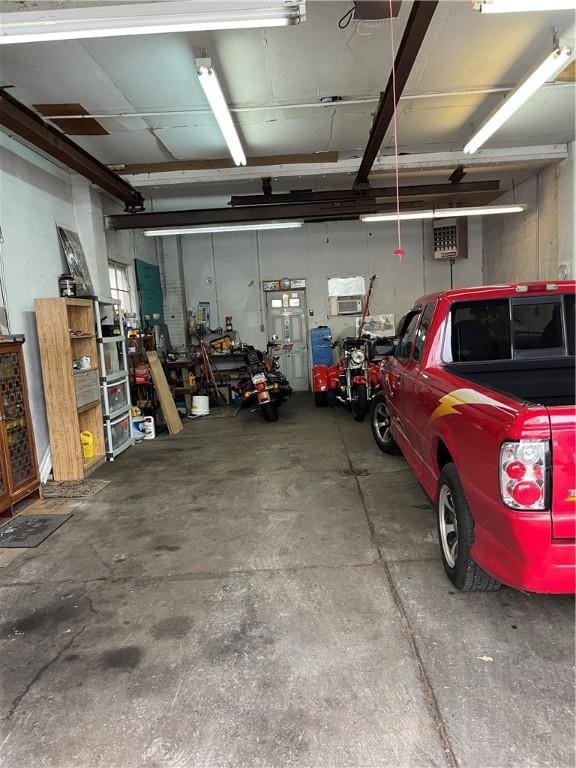 528 Longfellow St, Vandergrift Wml, PA 15690 - garage featuring a workshop area and a garage door opener