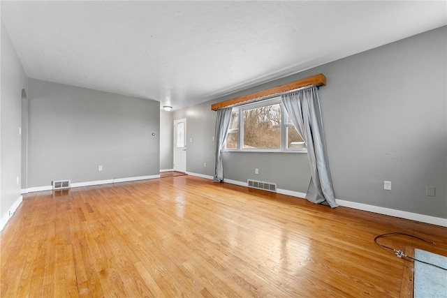 unfurnished room featuring light hardwood / wood-style floors