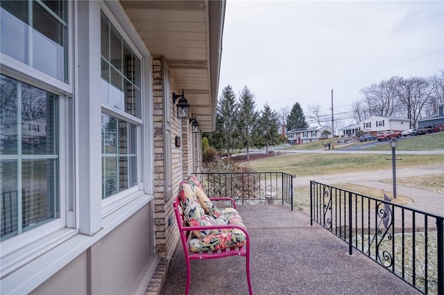 balcony featuring covered porch