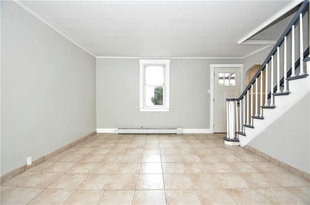 tiled entrance foyer with crown molding and baseboard heating