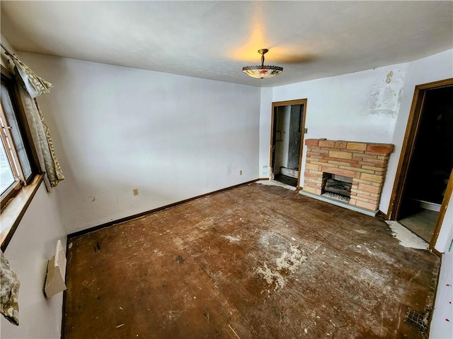 unfurnished living room featuring a fireplace