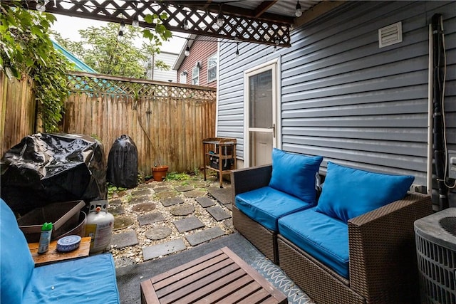 view of patio / terrace with a grill and an outdoor living space