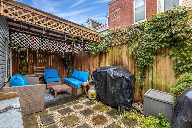 view of patio featuring area for grilling and outdoor lounge area