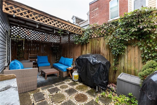 view of patio featuring outdoor lounge area and grilling area