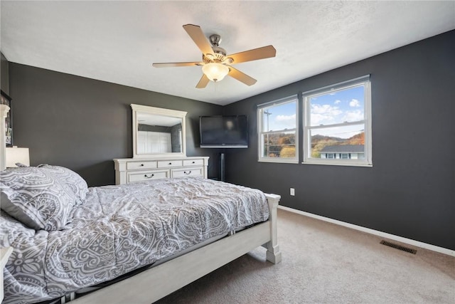 bedroom with carpet and ceiling fan