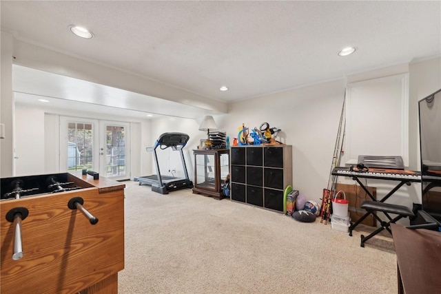 interior space with french doors and carpet