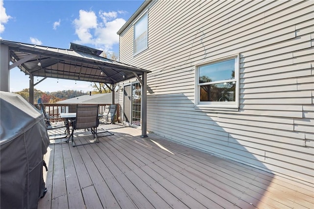 wooden terrace with a gazebo