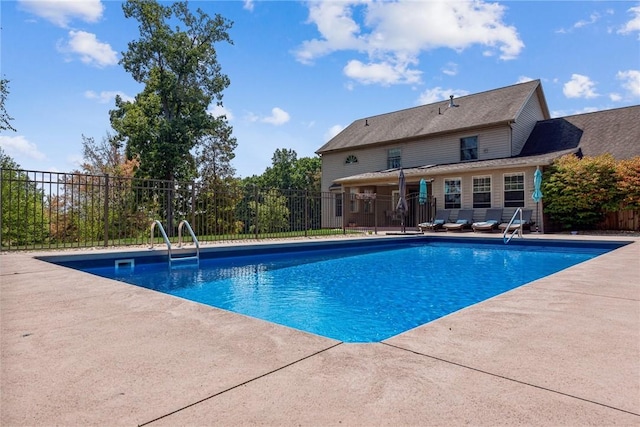 view of pool featuring a patio area