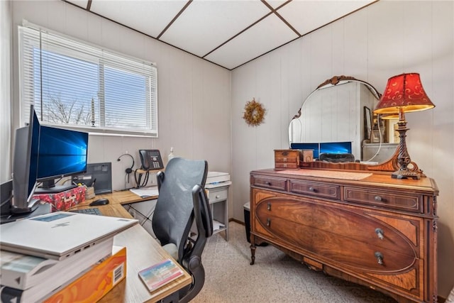 office area featuring a paneled ceiling