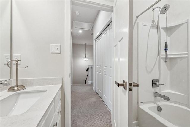 bathroom featuring vanity and shower / bath combination