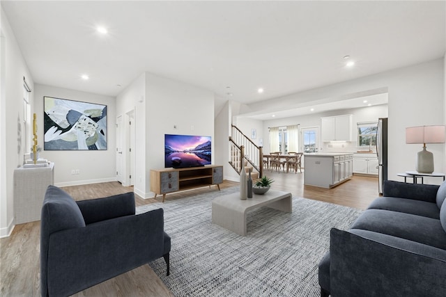 living room with light hardwood / wood-style floors