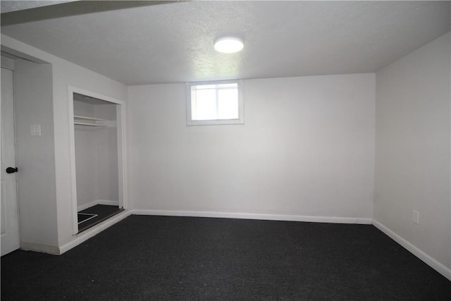 unfurnished bedroom with a textured ceiling