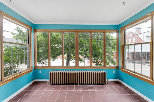 unfurnished sunroom with radiator