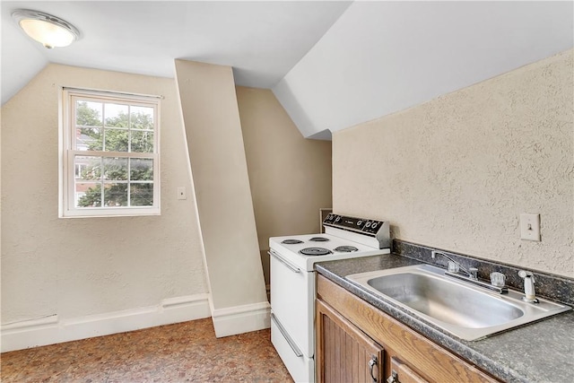 kitchen with lofted ceiling, white electric range, and sink