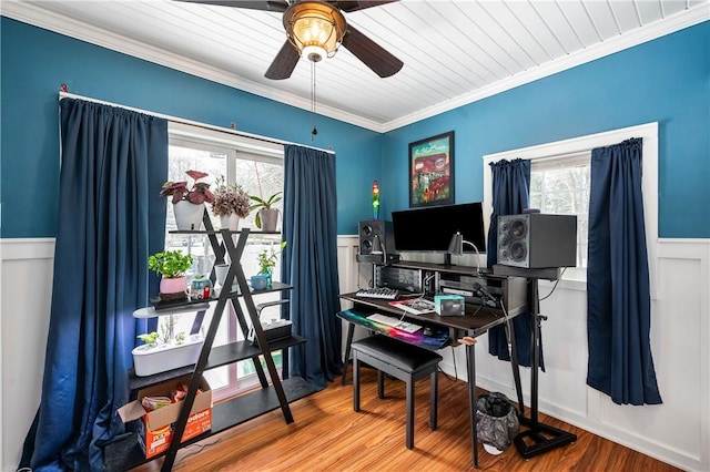 office space featuring ceiling fan, crown molding, and hardwood / wood-style flooring