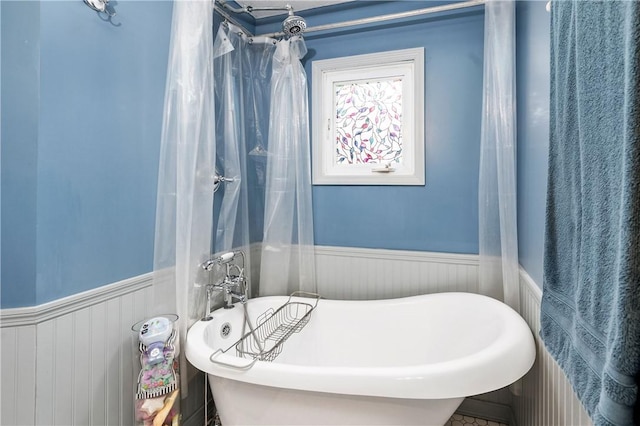 bathroom featuring a washtub