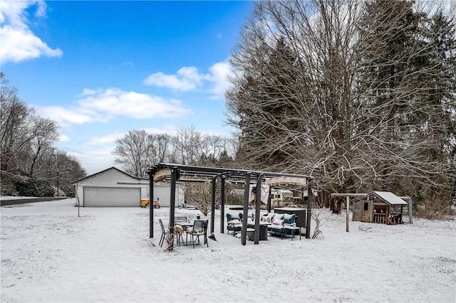 view of community featuring an outdoor living space and an outbuilding