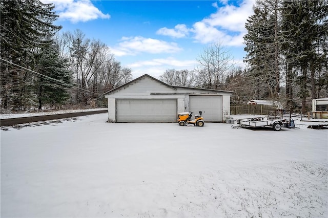 view of snow covered garage