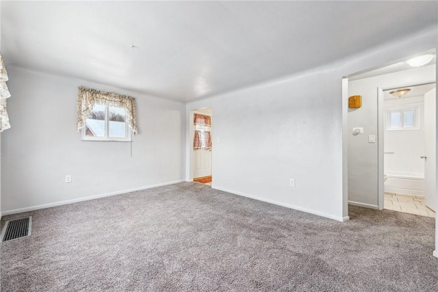 view of carpeted spare room