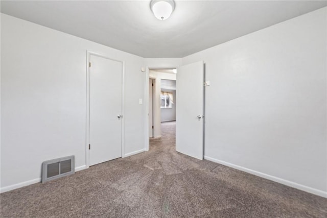 unfurnished room with carpet