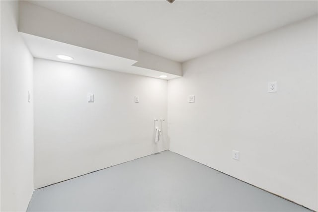 empty room with concrete flooring