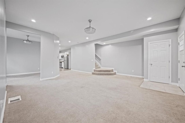 basement with light carpet