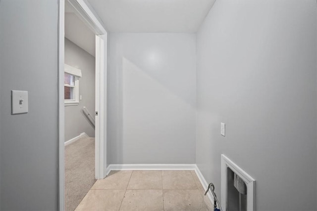 laundry room with light tile patterned floors