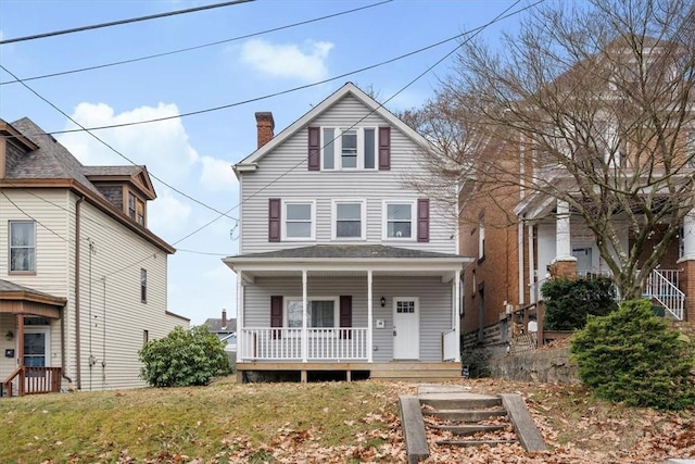 view of property featuring a porch