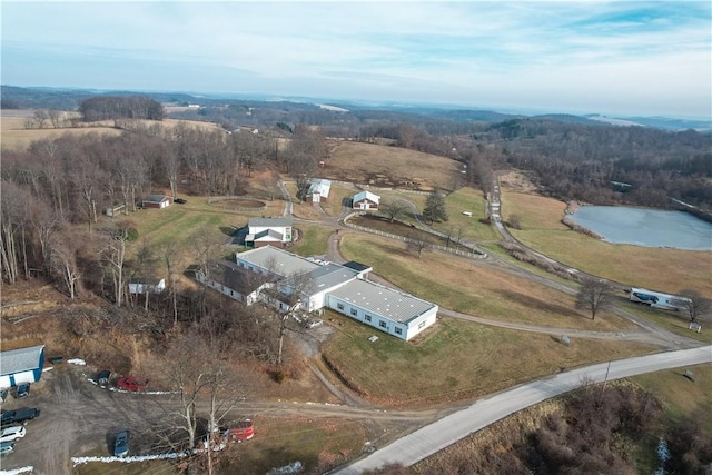 bird's eye view featuring a rural view and a water view