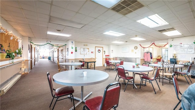 dining room featuring a paneled ceiling