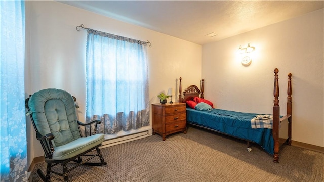 bedroom featuring carpet floors and baseboard heating