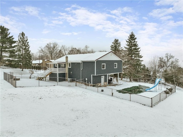 view of snow covered property